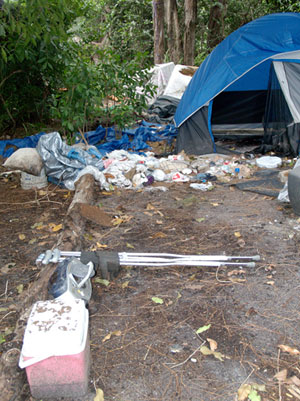 The Homeless Outreach team (HOT) visits a homeless
camp site off Military Trail in Lake Worth.