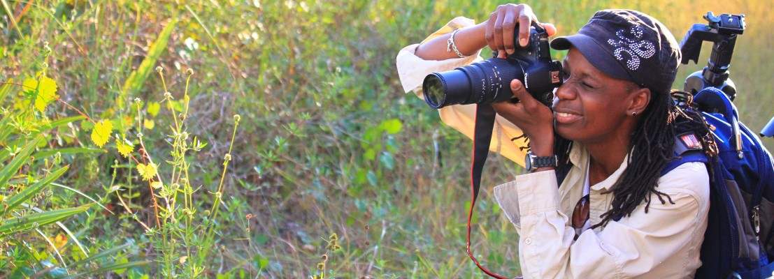 Person taking photos in a Palm Beach County Natural Area