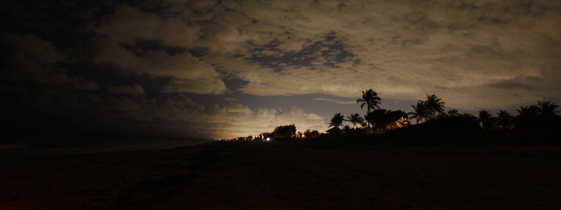 Scene showing inland skyglow reaching the beach