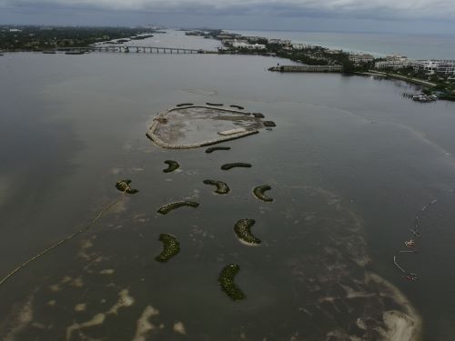 Aerial view of the north section of Bonefish Cove with the island and oyster reefs at low tide