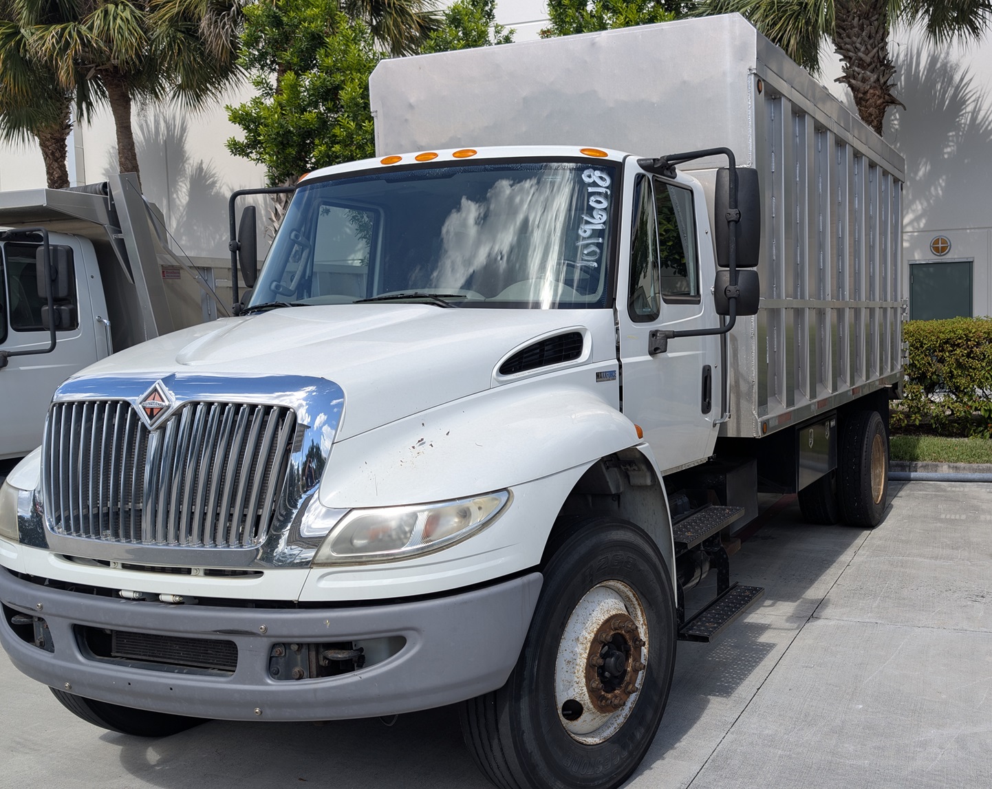 2015 INTERNATIONAL 4300 CHIPPER BODY DUMP TRUCK