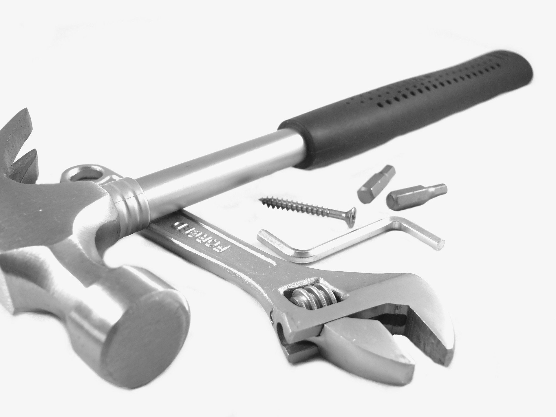 hammer, wrench and screws