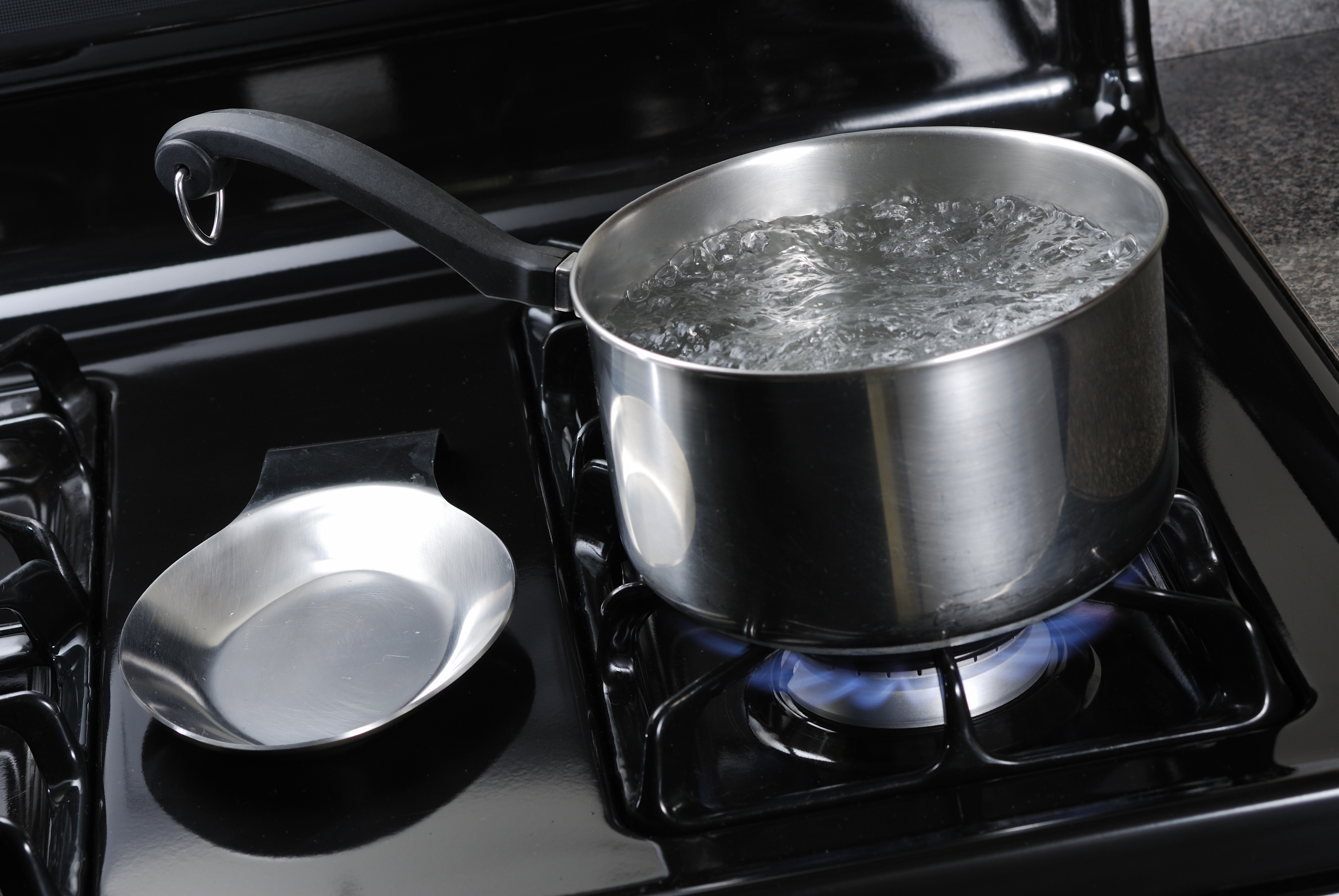 boiling water in a pot on a stove