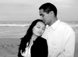 Woman leaning her head on man chest.