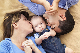 mother father and baby