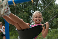 little girl on swing